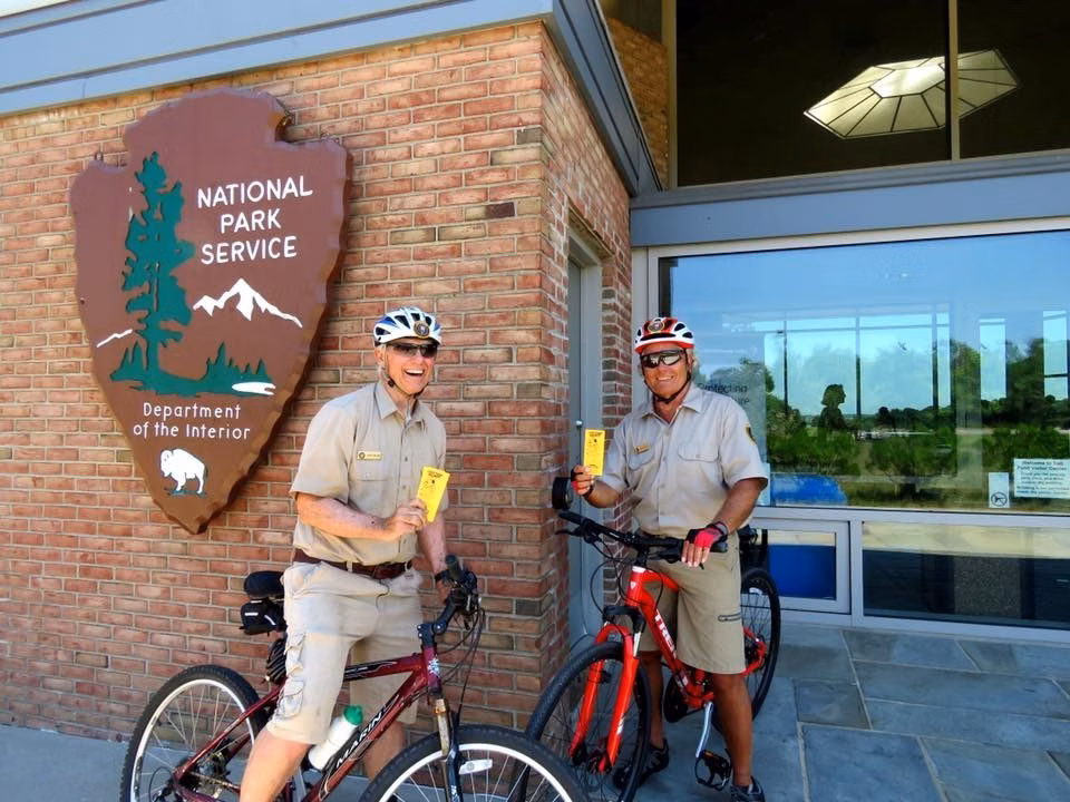 Two Cape Cod National Seashore bike trail volunteers with their bicycles